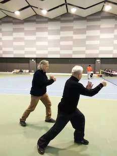 Jim training Taiji with DDA's Wang Ming Bo in Shanghai in 2019; learning the form!