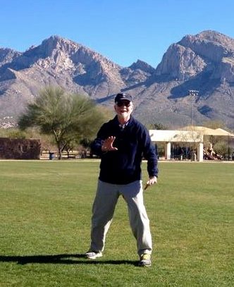Michael in Brush Knee Pose Flanked by Lemon Mountain, Tucson in 2016