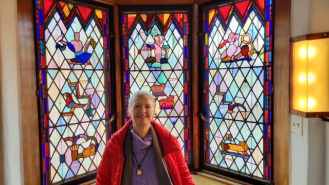 DDA's Rose enjoying the stained-glass artistry of Edgar Miller designs!