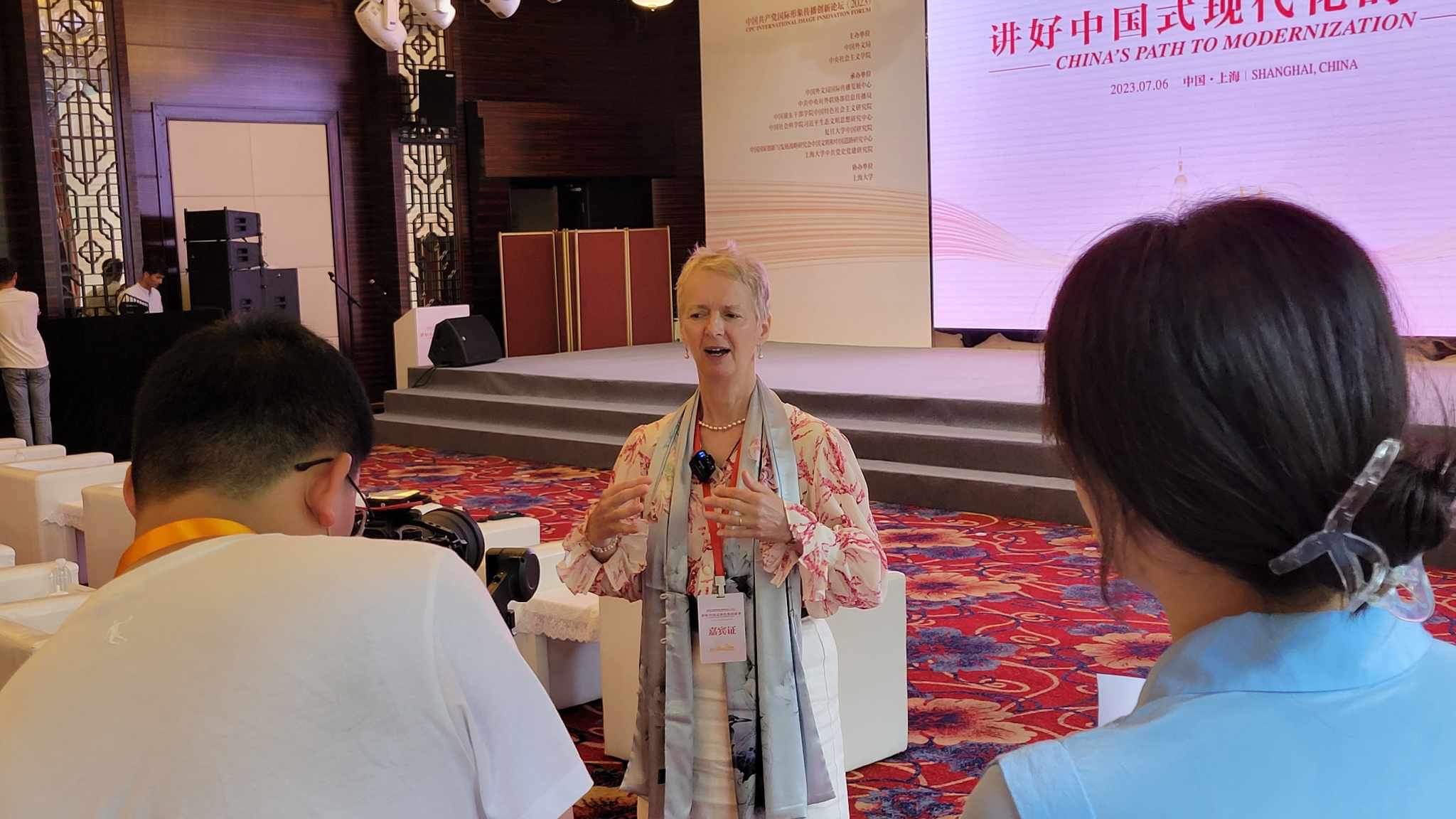 Rose being interviewed by the Beijing Review at the conference